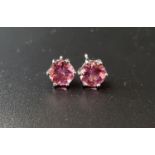PAIR OF PINK TOURMALINE STUD EARRINGS the round brilliant cut tourmaline on each approximately