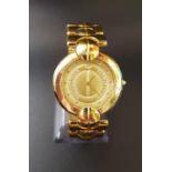 LARGER SIZE LADIES RODOLPHE BY LONGINES GOLD PLATED WRISTWATCH the circular gilt dial with hour