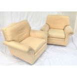 PAIR OF ARMCHAIRS each with a shaped back and scroll arms, with a loose seat and back cushion,