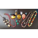 SELECTION OF MURANO AND SIMILAR GLASS JEWELLERY including three large glass pendants, one marked '