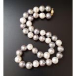 TRI-COLOUR CULTURED PEARL NECKLACE with white, light grey and dark grey pearls, with nine carat gold