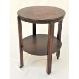 1950s ROSEWOOD ROTATING SERVING TROLLEY with a circular rotating top on four shaped supports