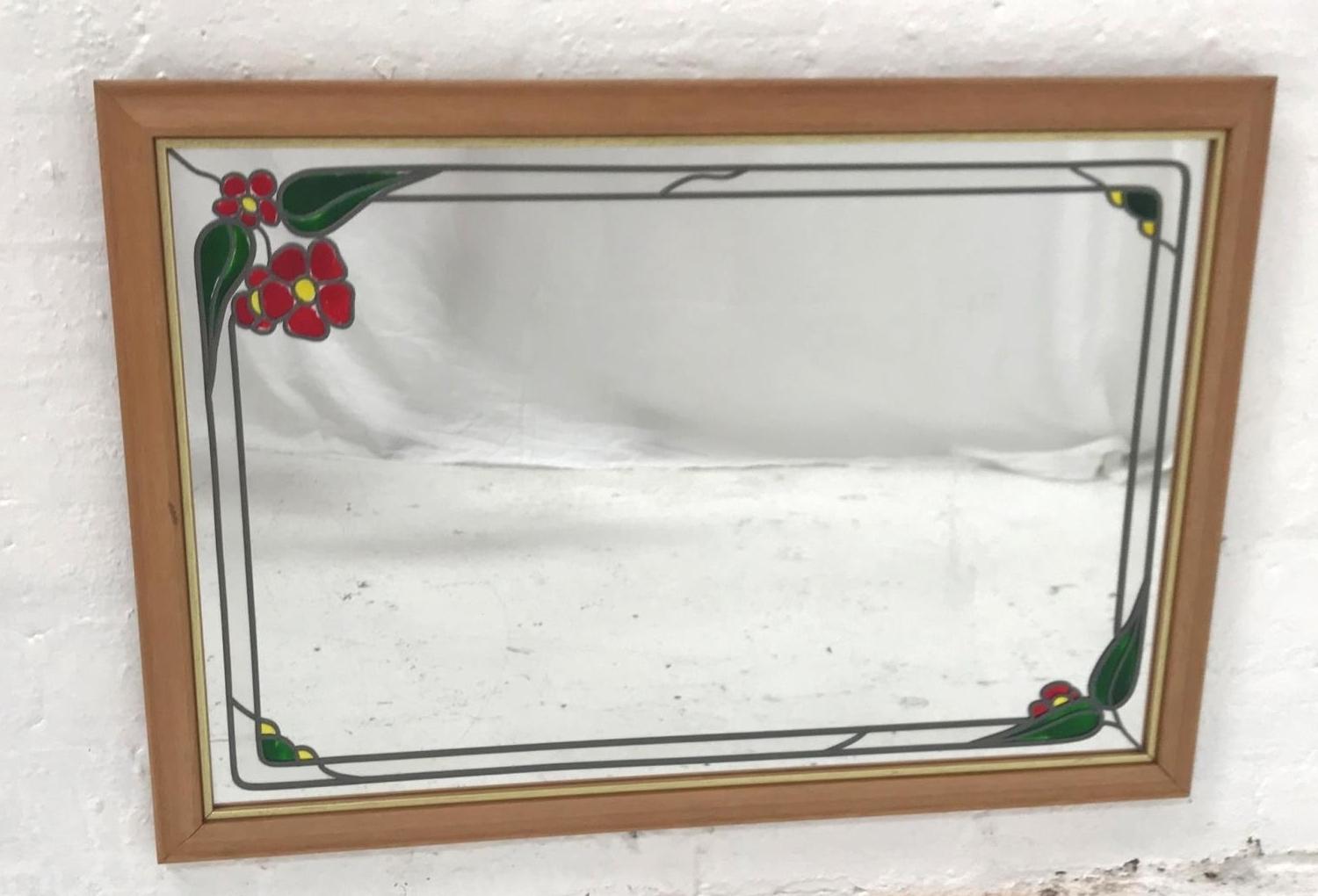 OBLONG WALL MIRROR with a floral leaded glass plate, 81.5cm wide