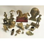 SELECTION OF DECORATIVE BRASS WARE including a Pharaohs mask, boy with an umbrella and watering can,