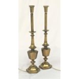 LARGE PAIR OF BRASS TABLE LAMPS raised on hexagonal bases with shaped bulbous columns, 80.5cm