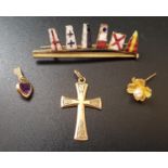 SMALL SELECTION OF NINE CARAT GOLD JEWELLERY comprising an enamel flag decorated brooch, a cross