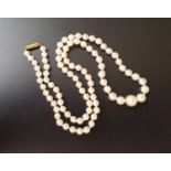 GRADUATED CULTURED PEARL NECKLACE with nine carat gold clasp, approximately 42.5cm long
