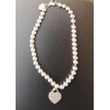 TIFFANY AND CO SILVER BEAD BRACELET with return to Tiffany heart tag