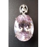 IMPRESSIVE KUNZITE SINGLE STONE PENDANT the large oval cut kunzite measuring approximately 2.4cm x