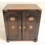 STAINED WOODEN TABLE BOX modelled as a safe with a pair of safe style doors with a heavy brass