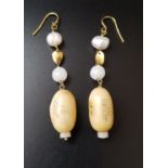 UNUSUAL PAIR OF SCRIMSHAW AND PEARL DROP EARRINGS the scrimshaw bead on each with engraved figural