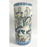 CHINESE POTTERY STICK STAND of cylindrical form decorated with a mountain scene, horse and rider and