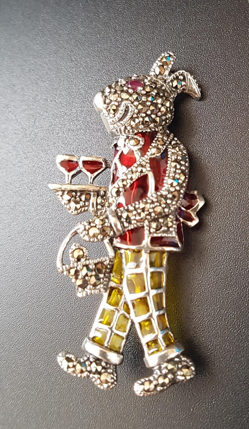 RUBY, MARCASITE AND ENAMEL DECORATED SILVER RABBIT BROOCH the rabbit modelled as a cocktail