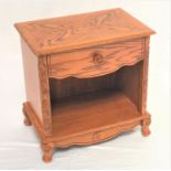 OAK SIDE CABINET with a quarter veneer top above a shaped frieze drawer and an open cupboard