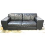 MODERN LEATHER THREE SEAT SOFA in black with broad square arms, standing on chrome supports, 223cm
