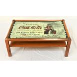 ADVERTISING TEAK OCCASIONAL TABLE with an inset mirrored top, 'Coca-Cola Refreshes You Best',