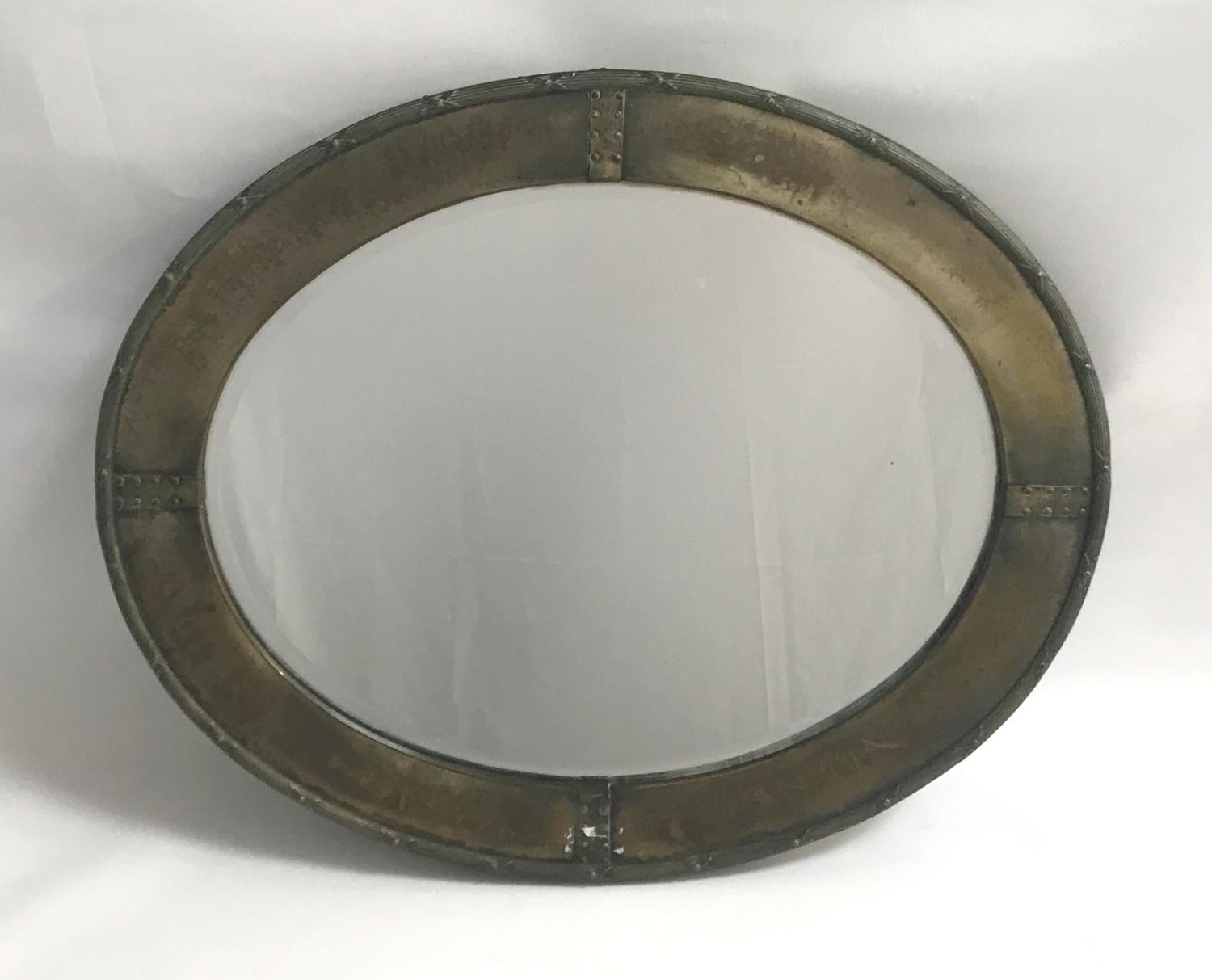 EARLY 20TH CENTURY ARTS & CRAFTS DESIGN BRASS FRAMED OVAL WALL MIRROR with bound reeded edge and