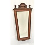 EARLY 20TH CENTURY LARGE OAK MIRROR with a shaped and carved pediment flanked by globe finials above