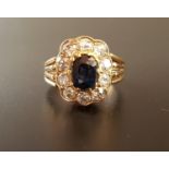 SAPPHIRE AND DIAMOND CLUSTER DRESS RING the central oval cut sapphire approximately 0.8cts in ten