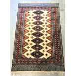 TABRIZ STYLE RUG the cream ground with blue and mustard diamond motifs encased in a multi layered