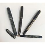 SELECTION OF FOUR VINTAGE FOUNTAIN PENS including three Parker Vacumatic pens, one in mottled silver