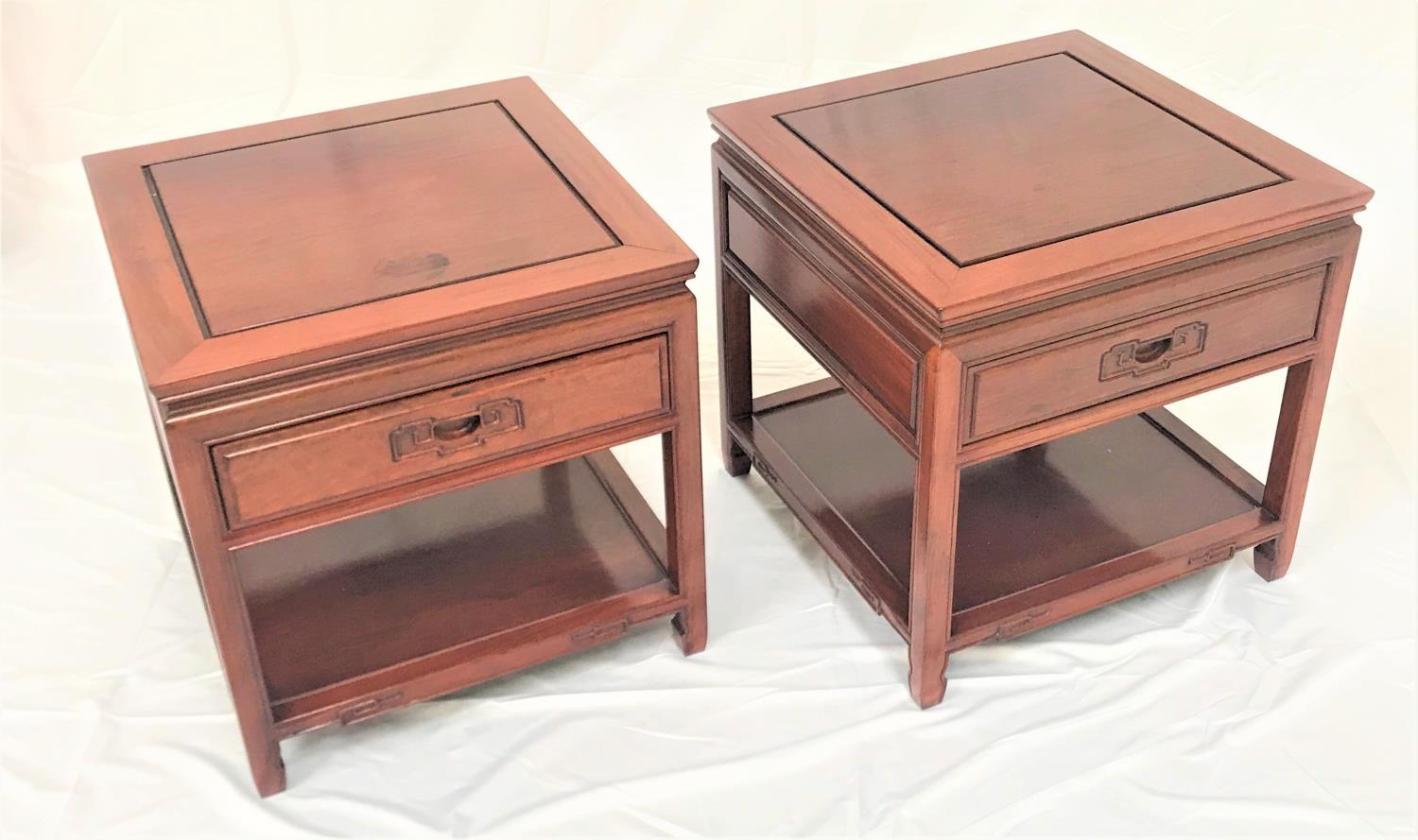 PAIR OF CHINESE ROSEWOOD SIDE TABLES each with a square top above a panelled moulded frieze with a