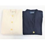 TWO PRINGLE OF SCOTLAND LAMSWOOL CARDIGANS one in cream with crew neck, cableknit detail and gold