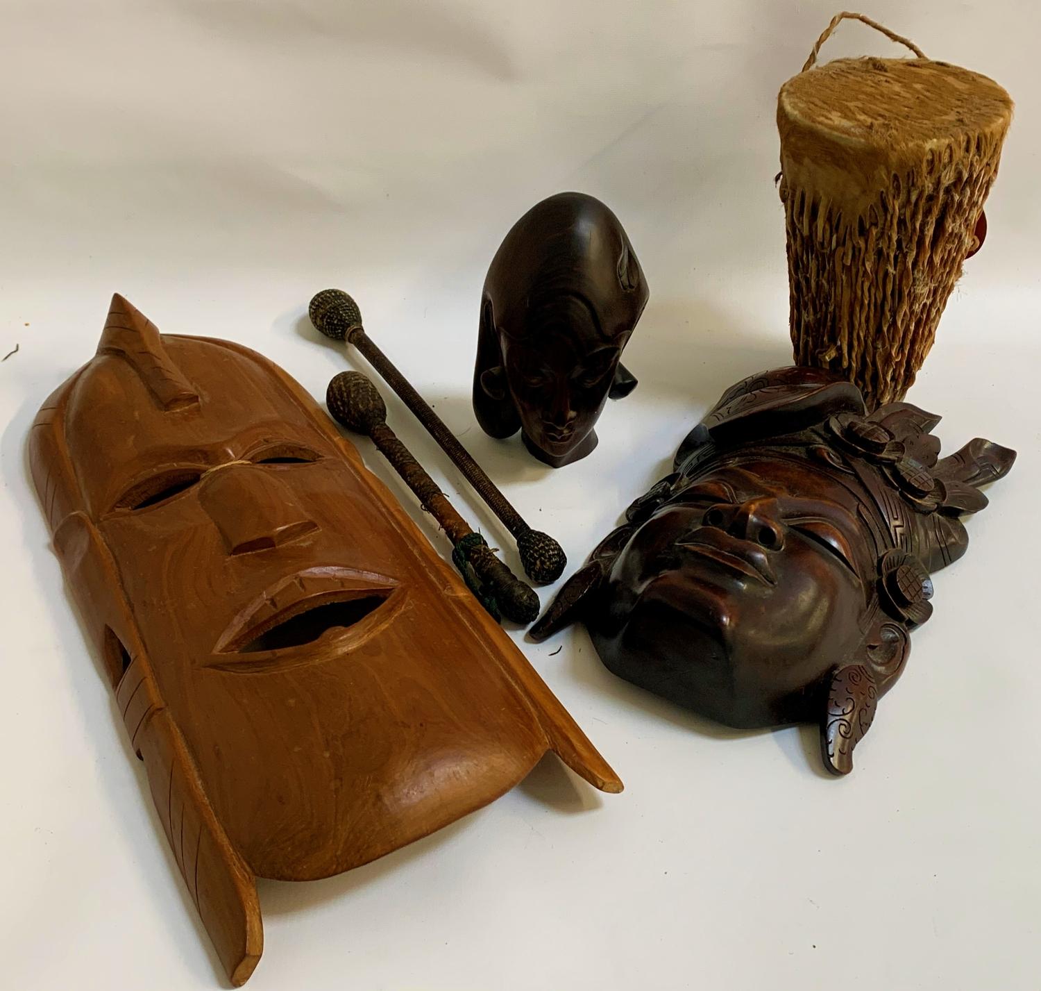 SELECTION OF AFRICAN AND ASIAN CARVED WOODEN ITEMS comprising an African carved Striped Macassar