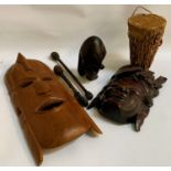 SELECTION OF AFRICAN AND ASIAN CARVED WOODEN ITEMS comprising an African carved Striped Macassar