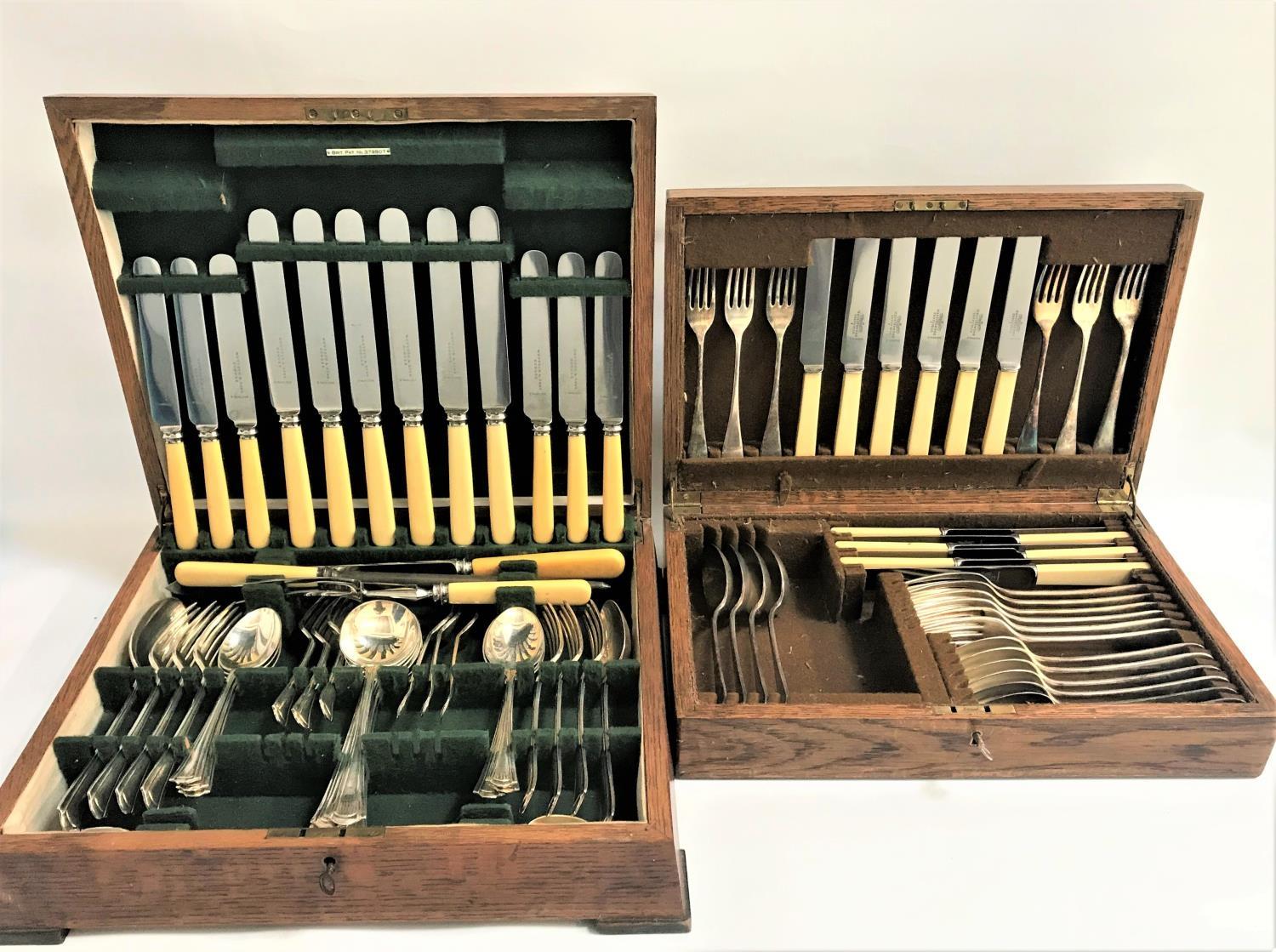 TWO OAK CASED CANTEENS OF PLATED CUTLERY one six place setting by Mappin & Webb; the other also a