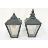 PAIR OF VICTORIAN STYLE EXTERNAL WALL LAMPS with steel bodies, one with a finial above four glass