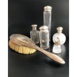 SELECTION OF VICTORIAN SILVER TOPPED OR COLLARED DRESSING TABLE BOTTLES of various shaped and sizes;