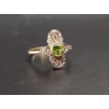 ART DECO STYLE PERIDOT AND DIAMOND PLAQUE RING the central round cut peridot approximately 0.5cts in