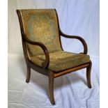 GEORGIAN STYLE MAHOGANY ARMCHAIR with a padded back and seat flanked by a reeded frame and reeded