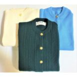 PRINGLE OF SCOTLAND SUPER LAMSWOOL CREW NECK CARDIGAN in hunter green with cable knit detail and