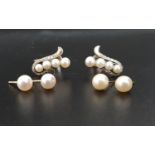 THREE PAIRS OF PEARL EARRINGSS comprising two pairs of stud earrings, one pair in eighteen carat