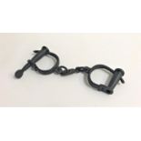PAIR OF VINTAGE POLICE OR PRISON HANDCUFFS with screw key operation