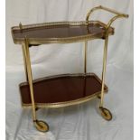 WOODMET GILT METAL HOSTESS TROLLEY with two shaped galleried removable trays, shaped handle and