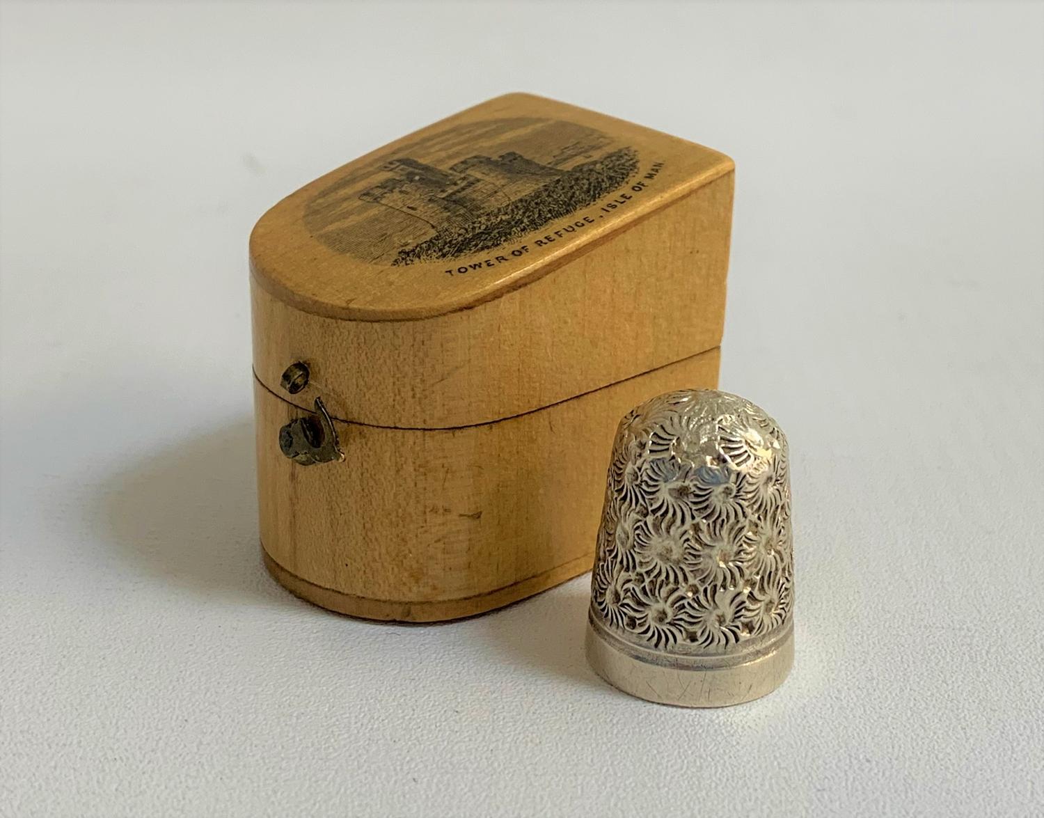 MAUCHLINE WARE THIMBLE HOLDER depicting The Tower of Refuge, Isle of Man, containing silver plated