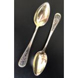 PAIR OF RUSSIAN SILVER SPOONS with floral niello decoration and gilt finish to interior of bowls and