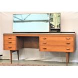 ALFRED COX MAHOGANY DRESSING TABLE with an octagonal bevelled mirror and a smaller adjustable