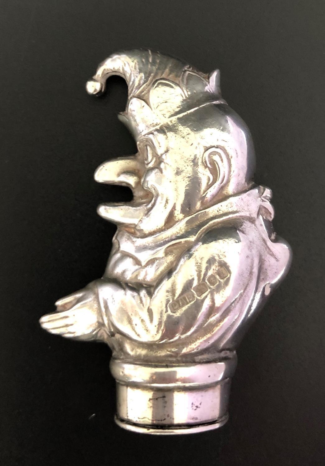 NOVELTY FIGURAL SILVER VESTA CASE in the form of Mr. Punch, with relief embossed body and hinged