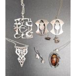 GOOD SELECTION OF SILVER PENDANTS AND OTHER JEWELLERY comprising an amber pendant on chain, with