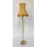 ALABASTER STANDARD LAMP raised on a circular base with an alabaster and gilt metal column, with a