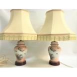 PAIR OF CHINESE STYLE LAMPS on a circular wooden base with bodies styled as lidded ginger jars, with