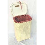 WHITE PAINTED LUSTY LLOYD LOOM LAUDRY BASKET of octagonal form, with red gingham interior fabric,