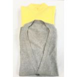 TWO PIECES OF CASHMERE CLOTHING comprising a light grey V-neck cardigan with pockets; and a yellow