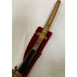REPRODUCTION JAPANESE SAMURAI SWORD with a 69.5cm blade and gilt metal tsuba, in an ebonised sheath