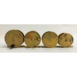 FOUR VINTAGE BRASS FISHING REELS ranging in size from 2"- 2.5" (4)