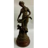 AFTER L. & F. MOREAU BRONZE PATINATED SPELTER FIGURE 'Bonne Recolte', the woman in flowing dress